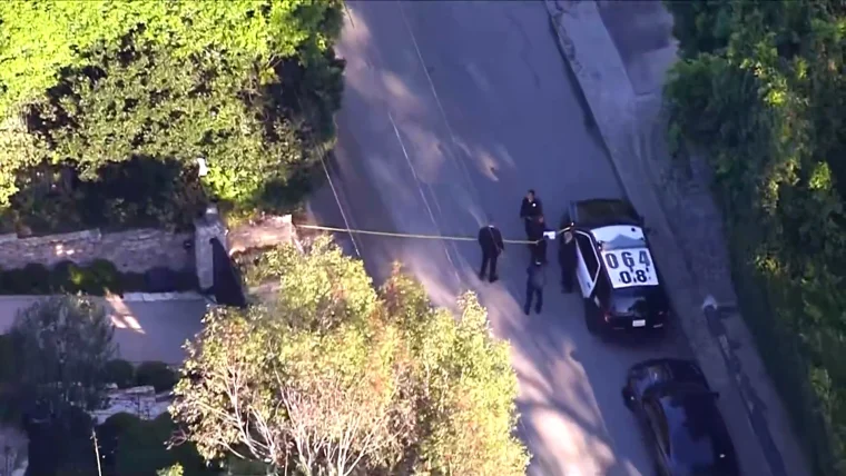 LAPD officers investigating a shooting incident outside Rihanna’s Beverly Hills residence.