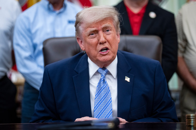 Donald Trump speaking during an immigration policy announcement in the United States.