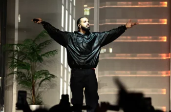Drake celebrates after winning a $1 million sports bet on Canada's World Cup victory over South Africa.