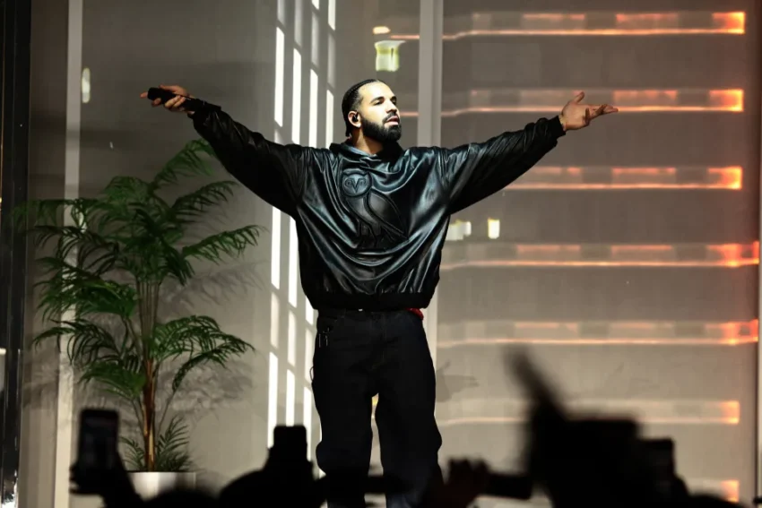 Drake celebrates after winning a $1 million sports bet on Canada's World Cup victory over South Africa.