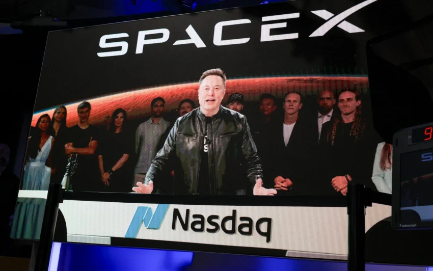 Elon Musk attends an event as reports emerge that he has lost trillionaire status following a decline in SpaceX shares.
