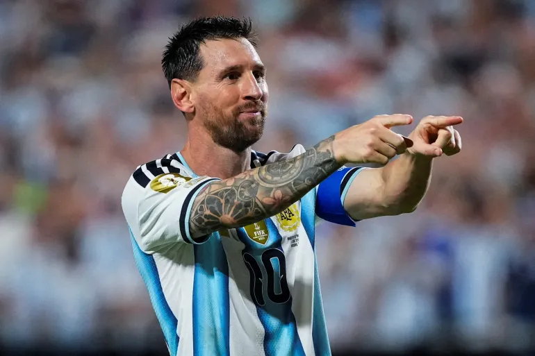Lionel Messi celebrating with Argentina during the FIFA World Cup 2026 group stage.