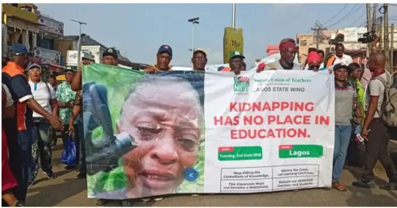 Protesters carrying placards during demonstrations calling for the rescue of abducted teachers and schoolchildren in Nigeria.