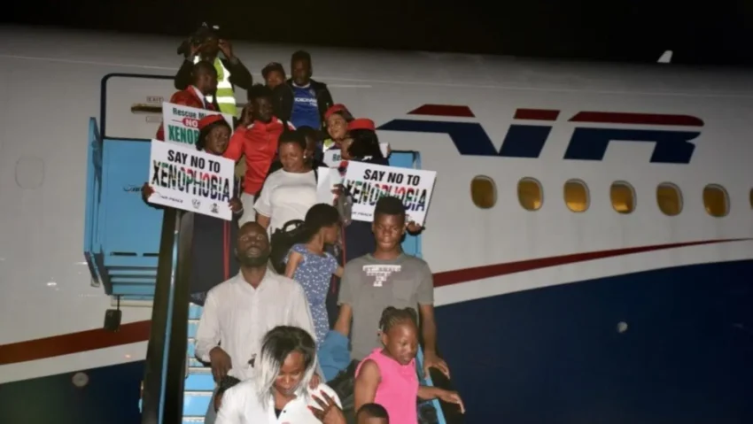 A Nigerian family arriving home after leaving South Africa, symbolising the emotional and financial challenges of forced migration.