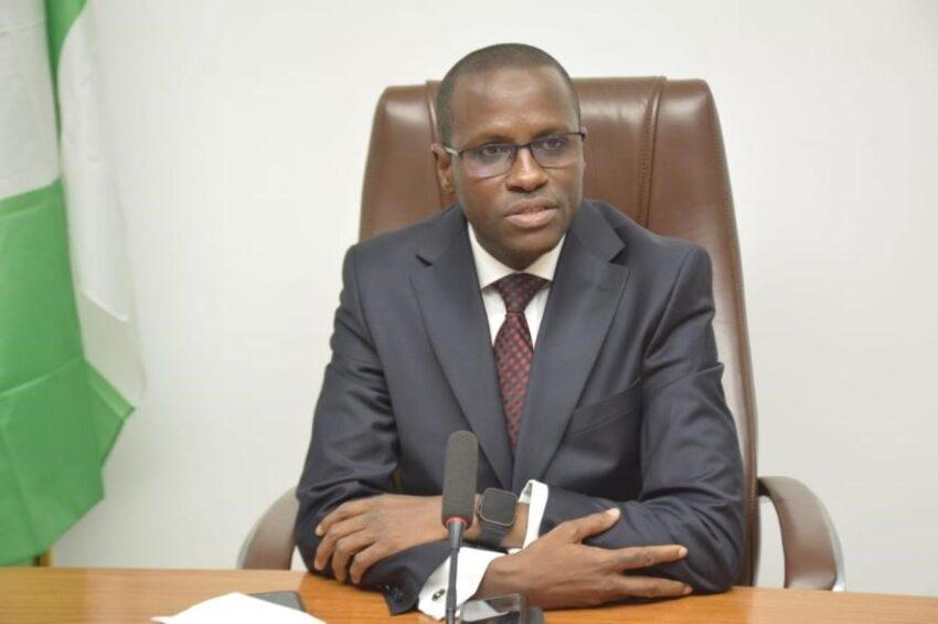 ICPC investigators reviewing documents during a corruption investigation in Nigeria.