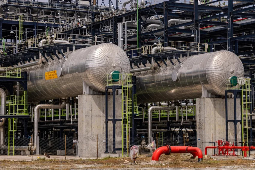 An industrial oil refinery representing Africa's largest refining facilities, including the Dangote Refinery and other major plants across the continent.
