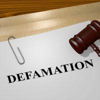 Illustration representing Nigerian law and defamation cases involving online publications.