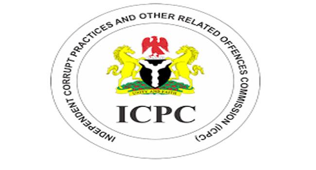 ICPC investigators and legal documents illustrating the process that follows an anti-corruption arrest in Nigeria.