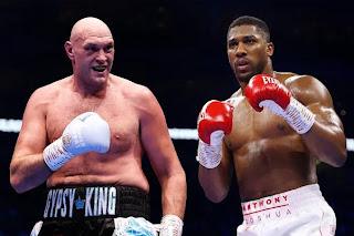 Anthony Joshua and Tyson Fury ahead of their December heavyweight fight in Cardiff